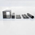 Co- Extrude a Flexible Rubber Type Material with The PVC Used Insome Glass Railing Systems