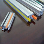 Customized Shaped Plastic T Slot Profile Extrusion Co-Extrusion Plastic PVC Profile for Building 10 Slot Plastic Cover Strip PP