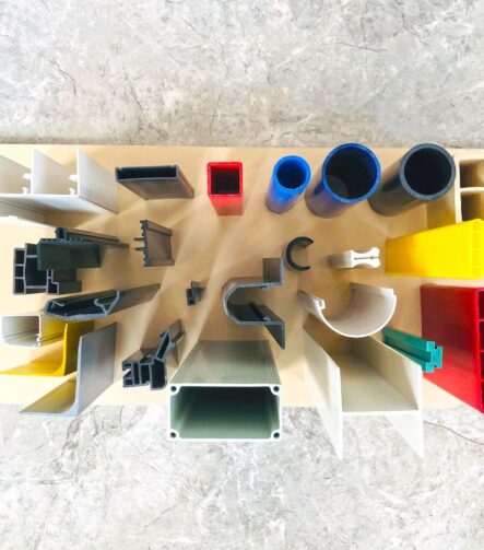 Hybrid Plastic Composite Extrusions Aluminum-PVC for Structural Reinforcement