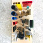 Hybrid Plastic Composite Extrusions Aluminum-PVC for Structural Reinforcement
